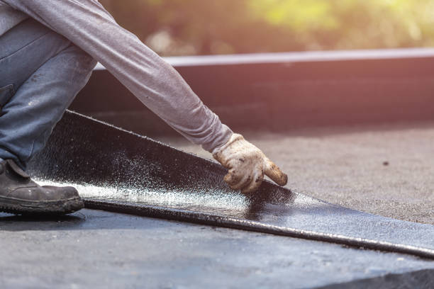 Professional Basement Waterproofing technician working in Cedar Springs, MI